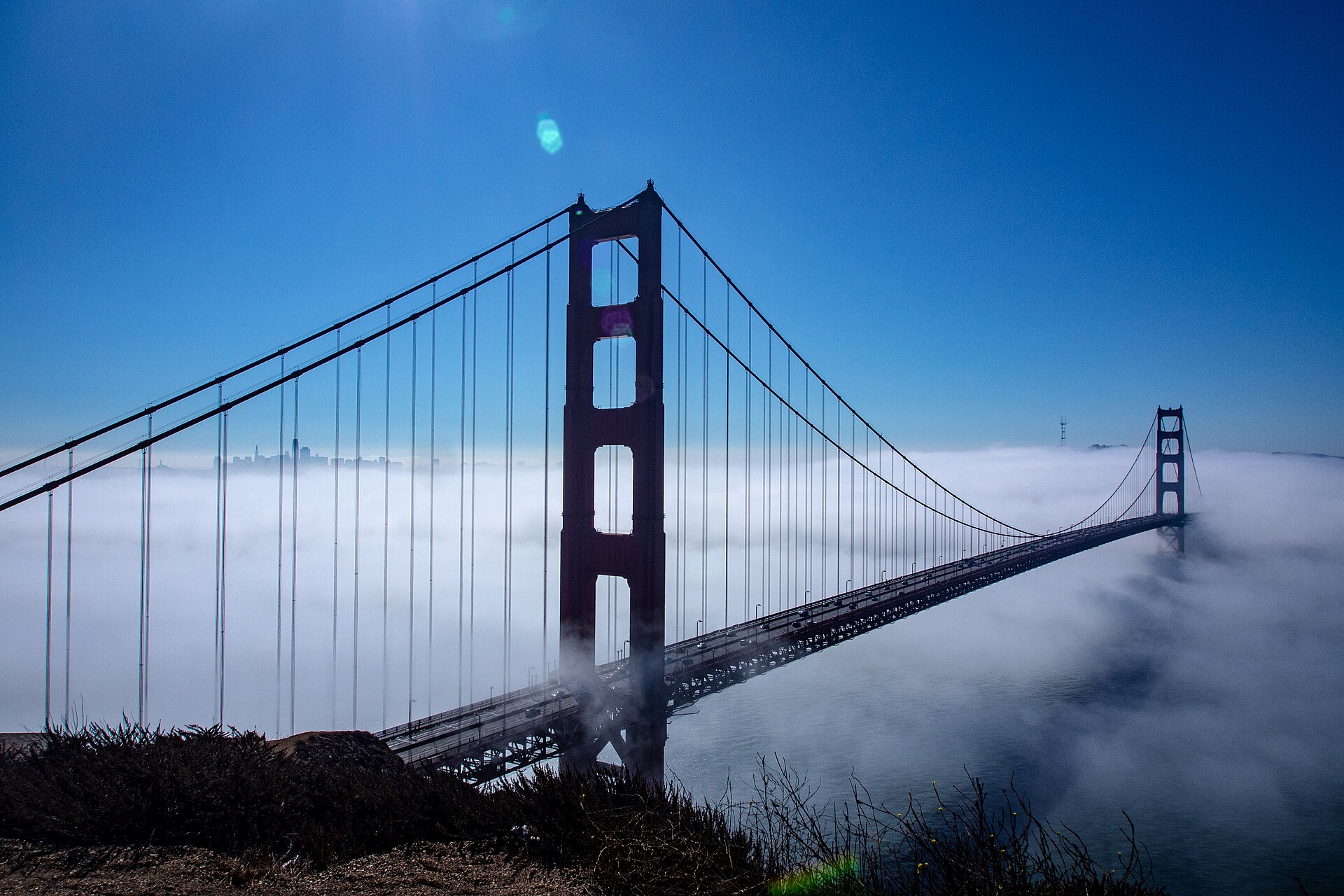 Golden Gate Bridge in San Francisco above the fog, seen from Battery Spencer